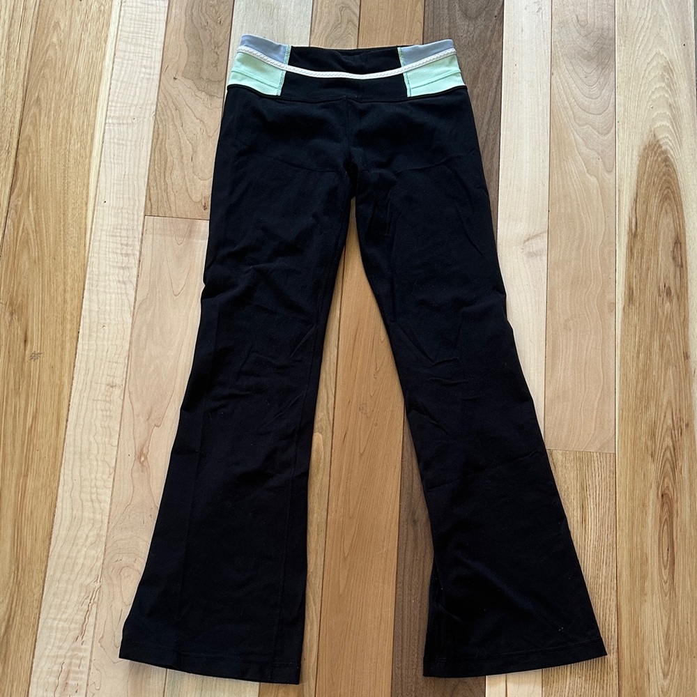 Lululemon Black Flare Yoga Pants with Mint Waistband